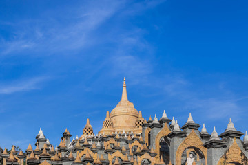 Fototapeta premium Sandstone pagoda in wat Pa Kung temple at Roi Et of Thailand on blue sky