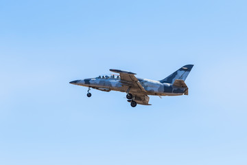 L-39 albatros fighter jet flying on blue sky  