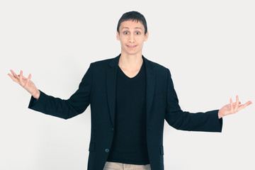 Handsome man doing different expressions in different sets of clothes: surprise