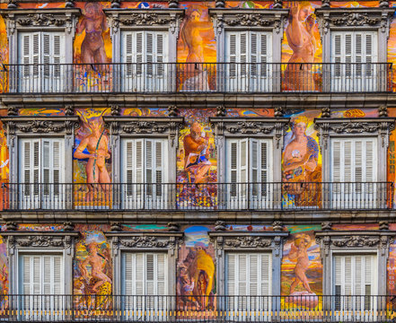 Detail of a decorated facade and balconies at the Palza Mayor, Madrid, Spain.