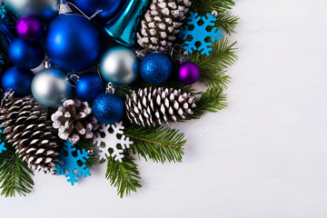 Christmas greeting background with blue and white felt snowflake