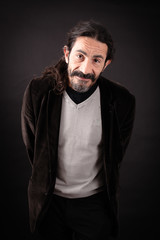 Handsome man doing different expressions in different sets of clothes: love