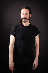 Naklejka premium Handsome man doing different expressions in different sets of clothes: thinking