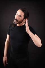 Handsome man doing different expressions in different sets of clothes: be careful