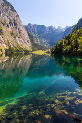 Fantastic views of the turquoise Lake Obersee under sunlight. Dramatic and picturesque scene. Location famous resort: Nafels, Mt. Brunnelistock, Swiss Alps. Europe. Artistic picture. Beauty world.