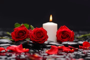 Foto op Canvas Still life with red rose with candle ,petals and therapy stones  © Mee Ting