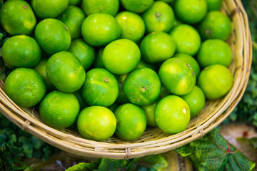 fresh lime in basket