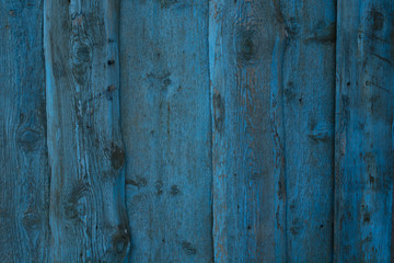 Fototapeta na wymiar Blue wooden palisaade background with vertical stripes