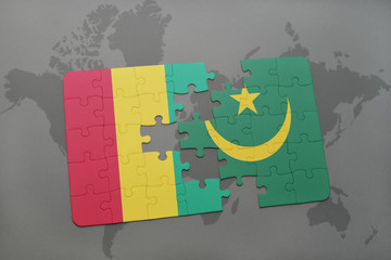puzzle with the national flag of guinea and mauritania on a world map