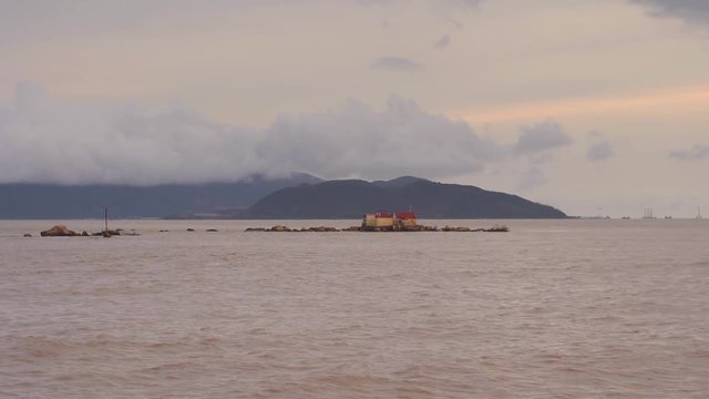 small fisherman's house in a sea in Vietname. Sunset. Nha Trang, Vietnam. travel landscape and destinations.