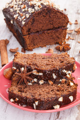 Gingerbread or dark cake with chocolate, cocoa and plum jam, delicious dessert