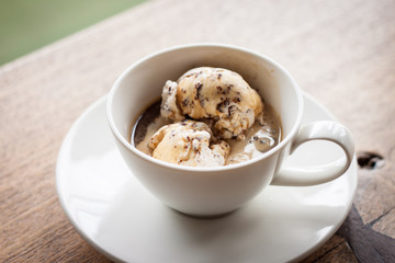 Affogato cup on top old wood