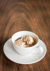 Affogato cup on top old wood