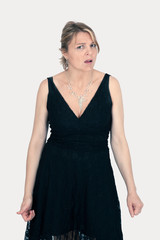 Fototapeta premium Beautiful woman doing different expressions in different sets of clothes: worried