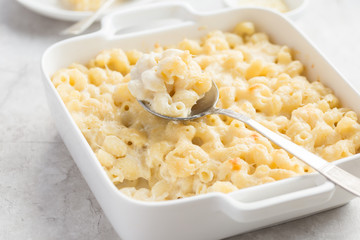 baked macaroni and cheese in white casserole dish