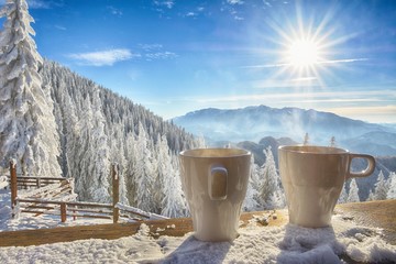 mugs and winter landscape