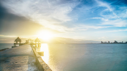 Beautiful sunset sky over jittapawan baddish Temple on the sea, Thailand landmark