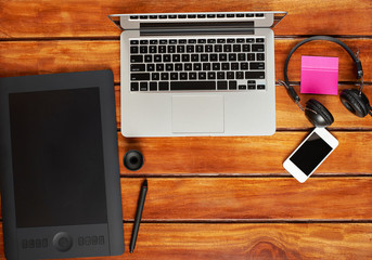 Photographer workspace on wooden desk