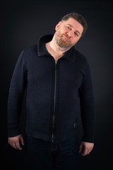 Naklejka premium Handsome Man doing different expressions in different sets of clothes: love