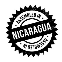 Fototapeta premium Assembled in Nicaragua rubber stamp. Grunge design with dust scratches. Effects can be easily removed for a clean, crisp look. Color is easily changed.