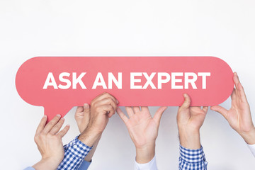 Group of people holding the ASK AN EXPERT written speech bubble