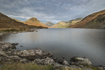 Naklejka premium Beautiful sunset landscape image of Wast Water and mountains in