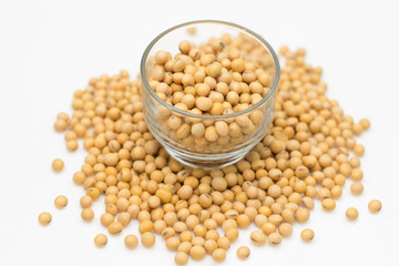 Soybeans on white table.
