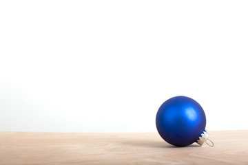 Blue Ornament on Wood