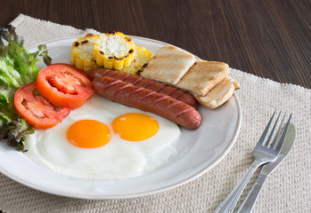 American breakfast with vegetables in white dish