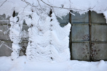 greenhouse covered with snow in Overijse Belgium