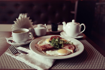 cup of tea or coffee in a cafe serving breakfast table