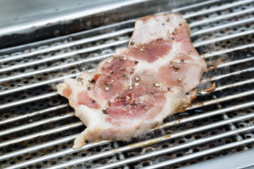 Grill pork with black pepper on Barbecue grills / Select focus..