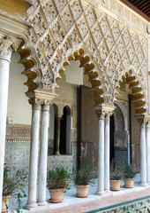 Moorish architecture inside the Royal Alcazars of Seville, Spain.