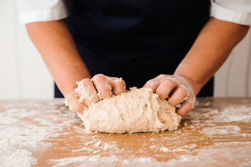 Chef preparing dough - cooking process
