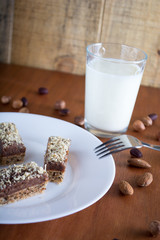 Chocolate cake with walnut cut into squares