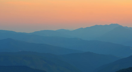 Fototapeta na wymiar Silhouettes of the mountain hills