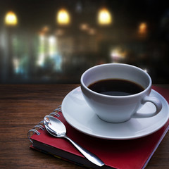 White cup of coffee on vintage wood. Top view ,  cup on wooden t