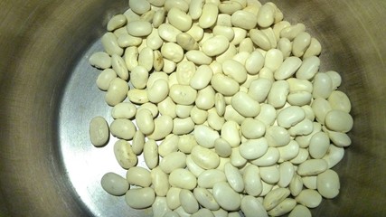 raw beans in a pot for cooking