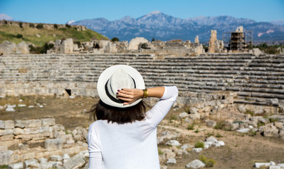 girl looks at the ancien arena
