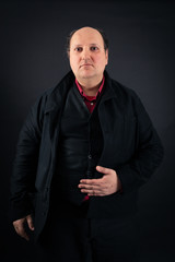 Handsome man doing different expressions in different sets of clothes: hungry