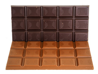 Person holding a whole bar of dark chocolate isolated towards wh