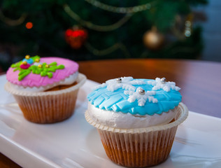 cupcake on table against the background of Christmas tree