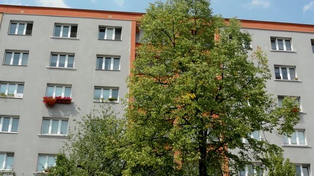 view of the prefab housing estate in the suburb - many flast with windows