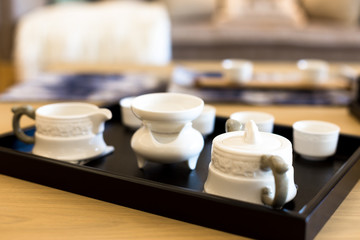 Fototapeta na wymiar elegant ceramic tea sets on table in modern living room