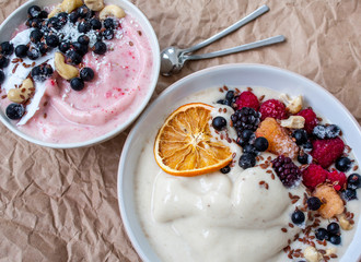 Smoothie bowl, banana ice cream with berries, nuts, flax. Perfect for the detox diet or just a healthy meal.  Love for a healthy raw food concept.