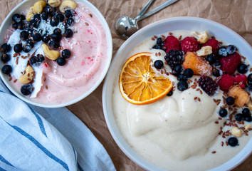 Smoothie bowl, banana ice cream with berries, nuts, flax. Perfect for the detox diet or just a healthy meal.  Love for a healthy raw food concept.