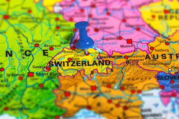Bern in Switzerland pinned on colorful political map of Europe. Geopolitical school atlas. Tilt shift effect.
