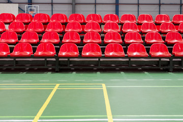 Obraz premium red rows of seats in a sports hall