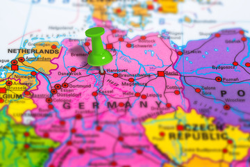 hannover in Germany pinned on colorful political map of Europe. Geopolitical school atlas. Tilt...