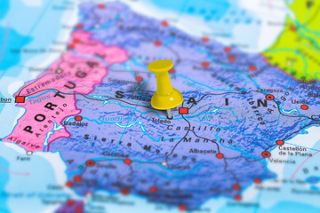 Toledo in Spain pinned on colorful political map of Europe. Geopolitical school atlas. Tilt shift effect.